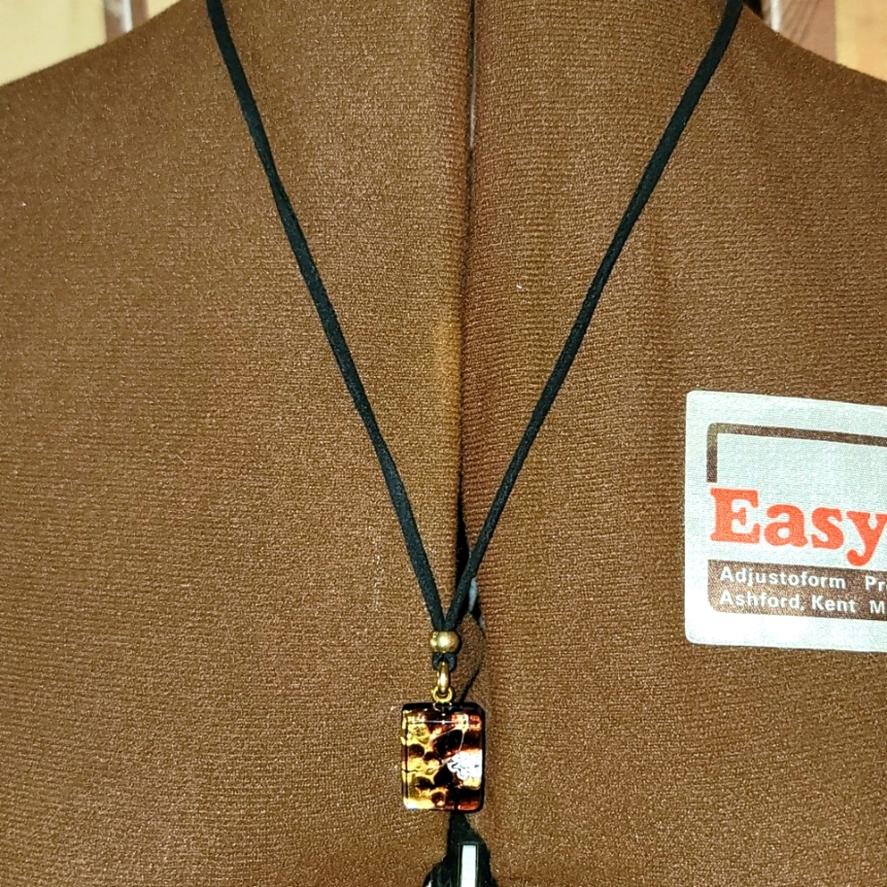 Men's Necklace New never worn condition made in Italy 23" long glass & leather
